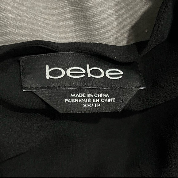 Bebe White & Black Sleeveless Wrap Blouse Built in Cami Size XS - Picture 7 of 9